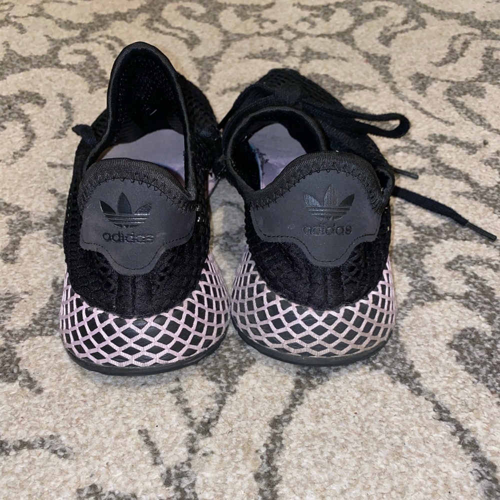 Black and lilac Adidas deerupt sneaker